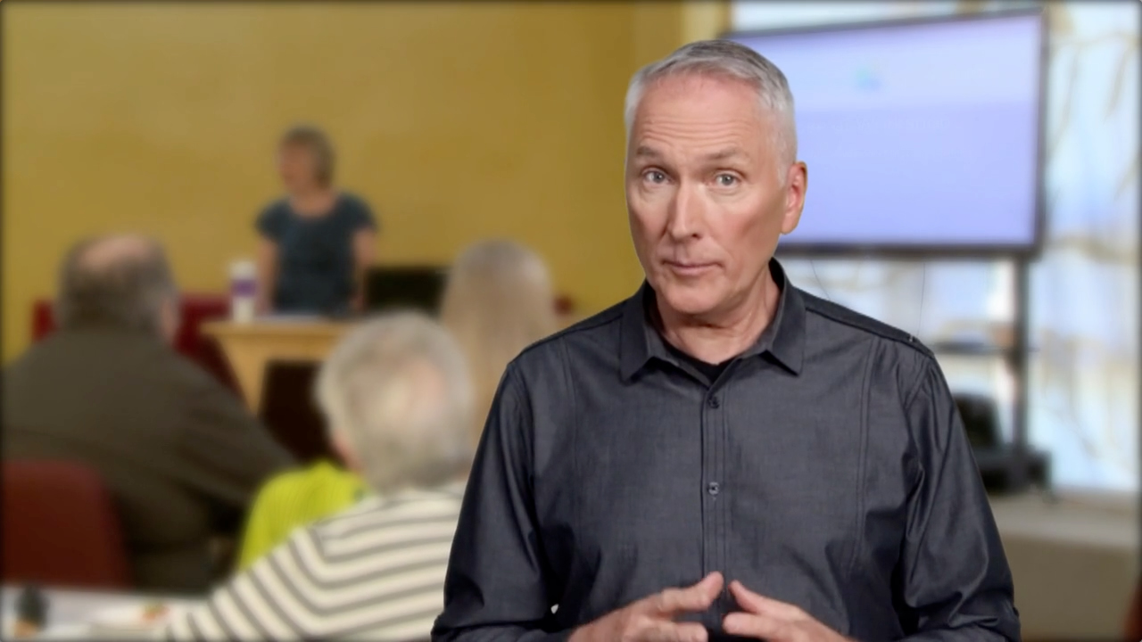 people watching video in a workshop