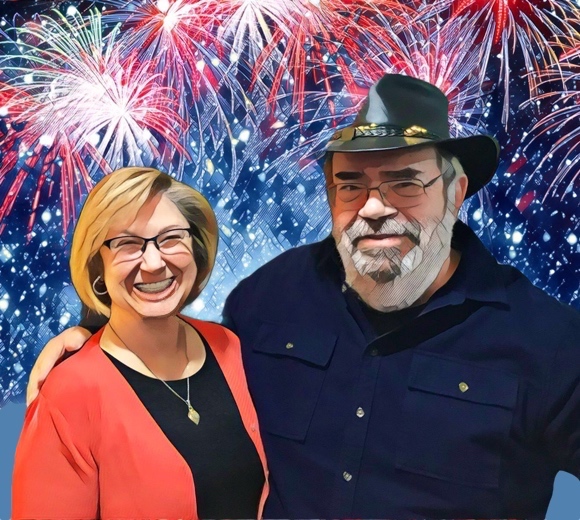 Ruth and Bruce with fireworks in the background